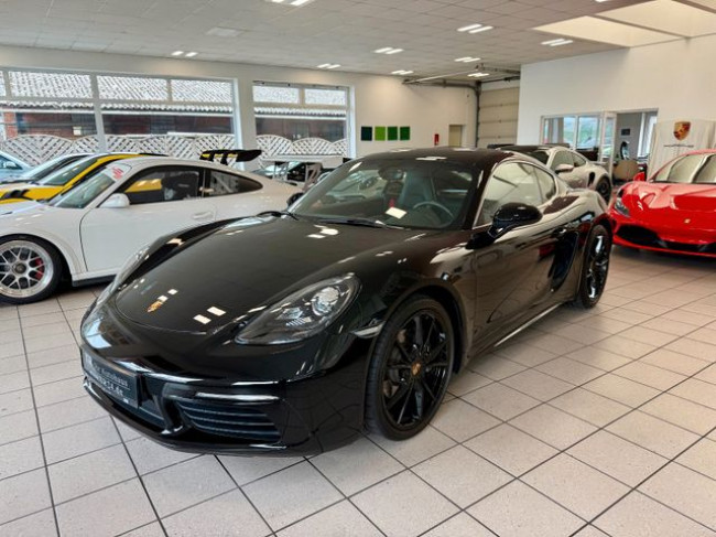 PORSCHE CAYMAN (718) IN TIEFSCHWARZ . 1, HAND